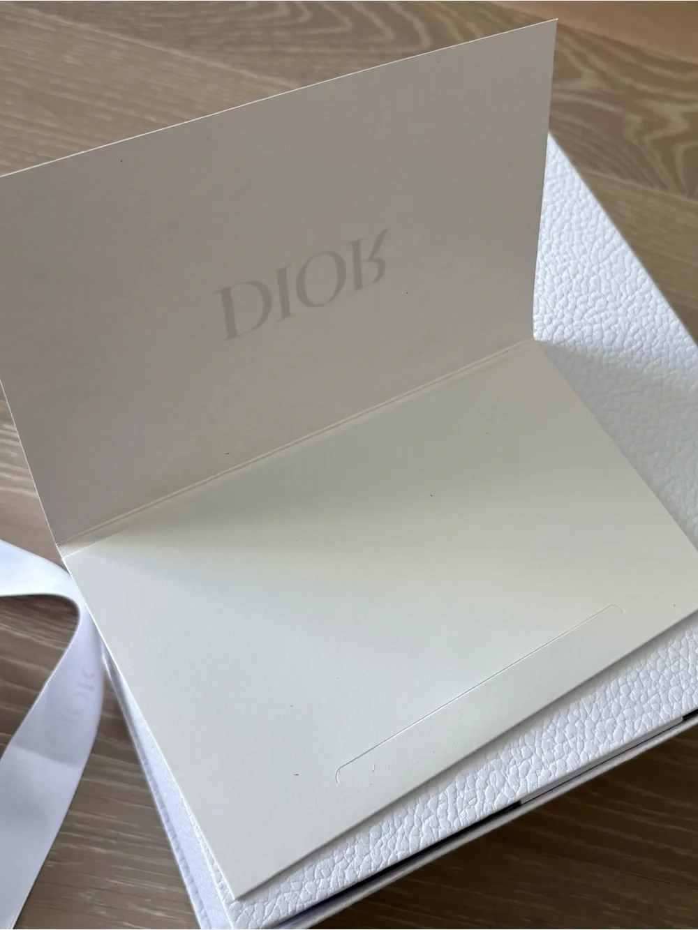 Dior gift box and bag with logo ribbon
